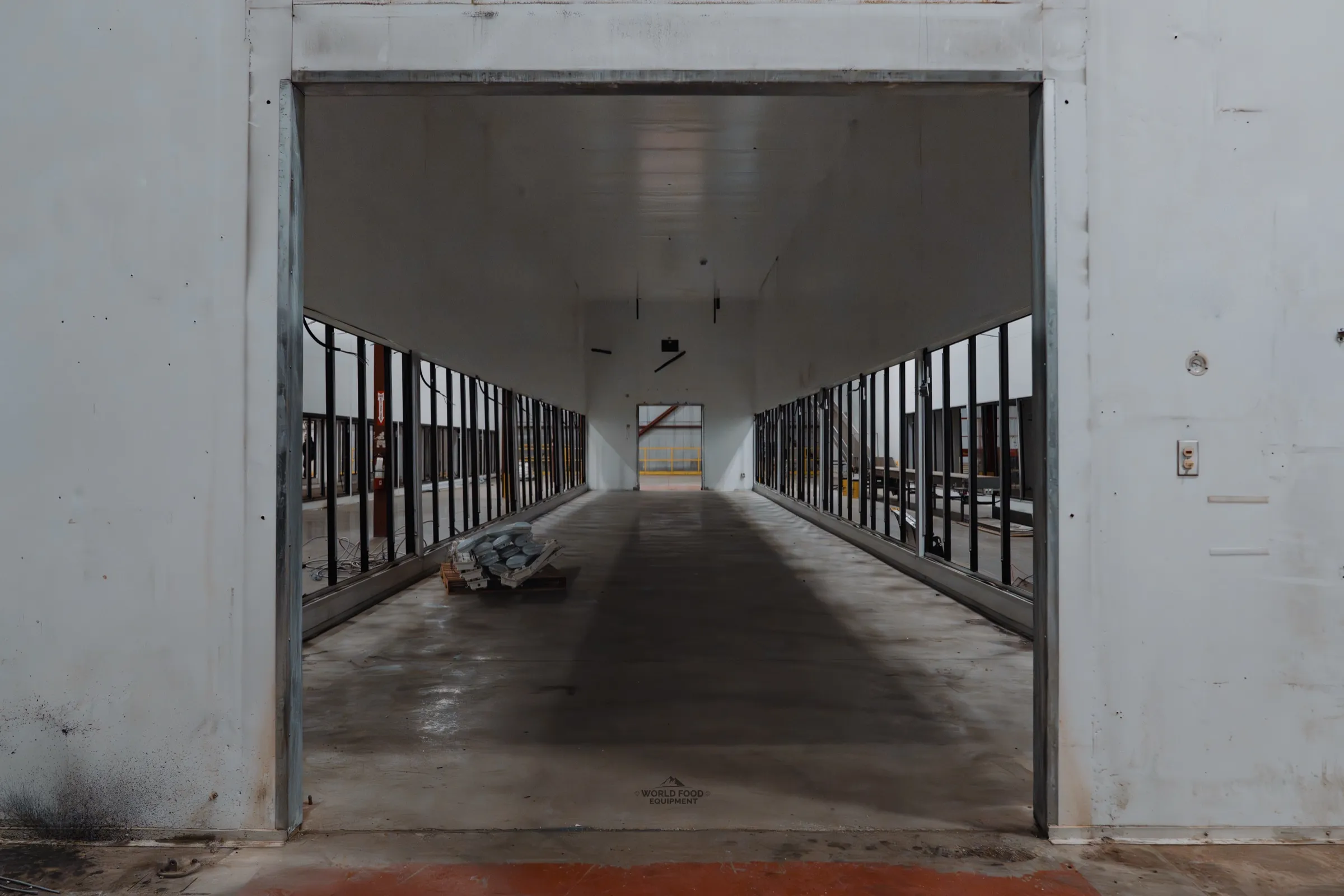 Longo's grocery refrigeration decommissioning project, video poster showing the cooler corridor mid-removal